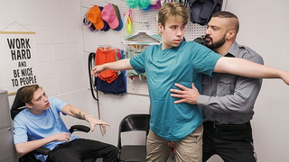 Security officer brings two suspected perps into the backroom