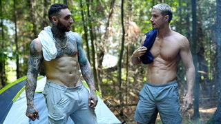 Two studs on camping trip
