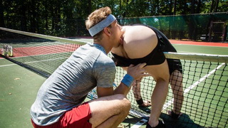 Outmatched at the game Michael leans over the net and begs for some help...